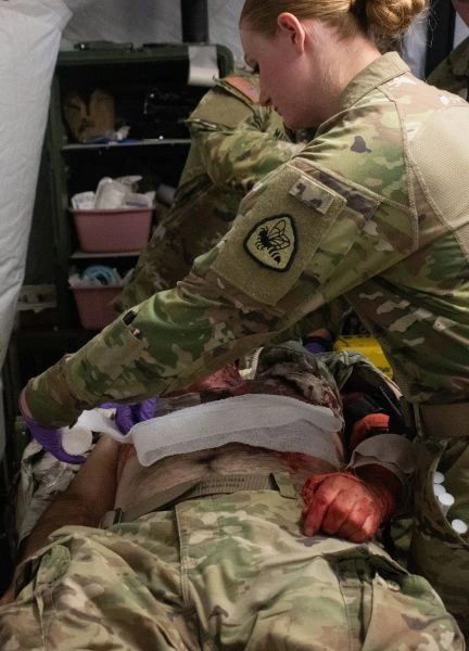 A soldier conducts medical training