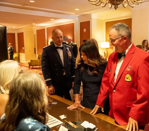 Guests check in at a formal event