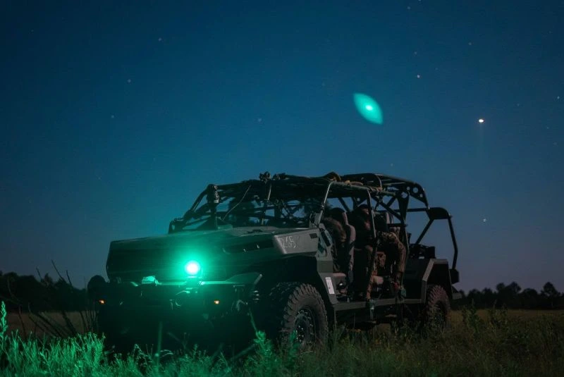 Military Jeep underneath the night sky