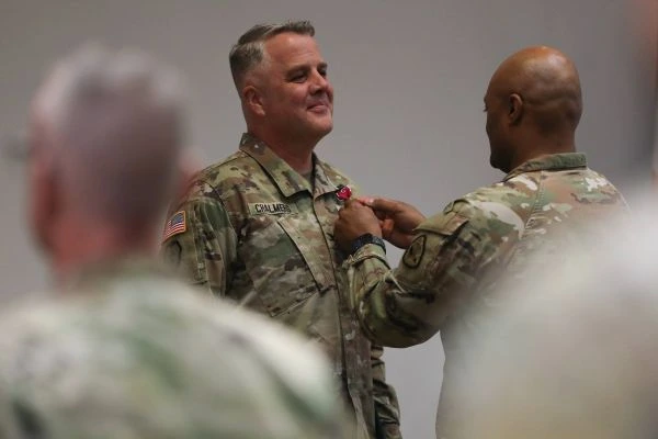 A soldier is awarded a medal