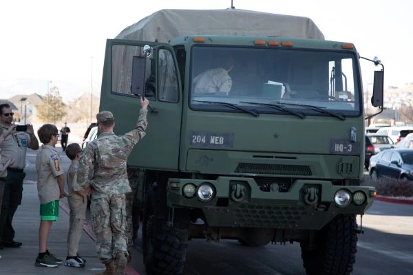 Boy Scouts are getting to check out a National Guard truck