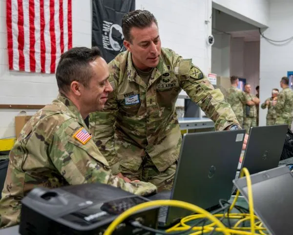 Two servicemember review computers